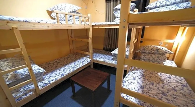 Кровать в общем номере (мужской номер) Suzhou Mingya Hostel