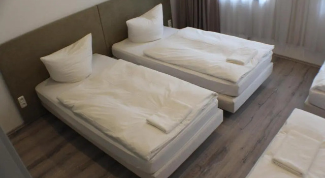 Кровать в общем номере Slamba Hostel