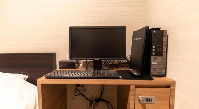 Кровать в общем номере (мужской номер) Tabist Hotel Smart Sleeps Oita Station