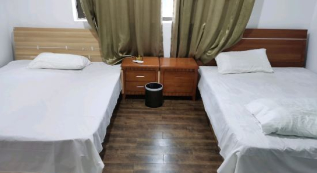Кровать в общем номере Happy 100 B&B