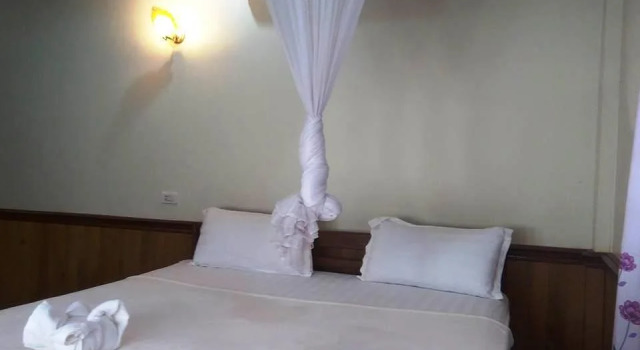 Nongsak Guesthouse, Rezerwuj Hotel Hotele w Ban Khon z parkingiem, Parking