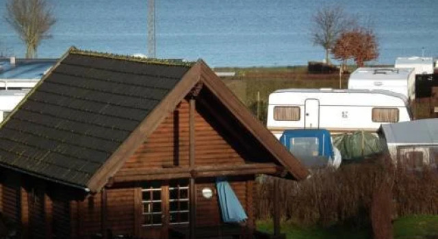Sandskaer Strandcamping & Cottages, Забронировать Отель Обенро 