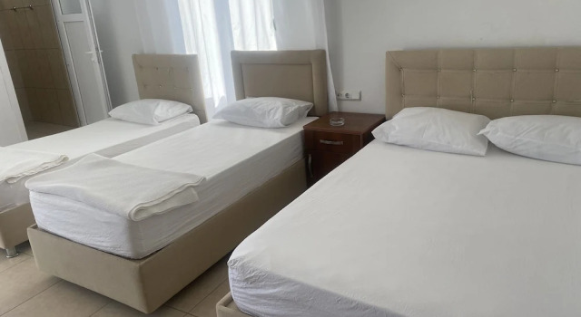 Четырёхместный номер Comfort с балконом и с видом на море Otel Can