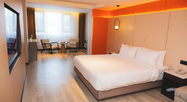 Полулюкс Jiuding Joy Hotel