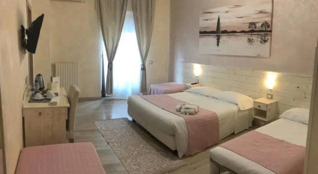 Четырёхместный номер Superior Fiumicino Airport B&B Deluxe