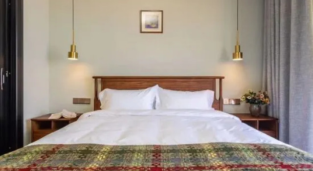 Люкс с 2 комнатами с видом на озеро Fanhua Motel
