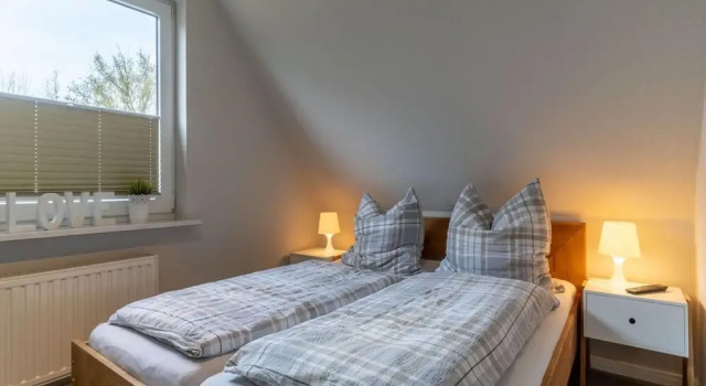 Апартаменты Ferienwohnung Strandperle