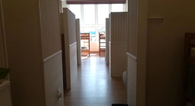 Кровать в общем номере Albergue Ultreia
