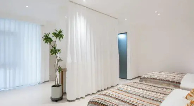 Кровать в общем номере Beijing Under The Tree B&B