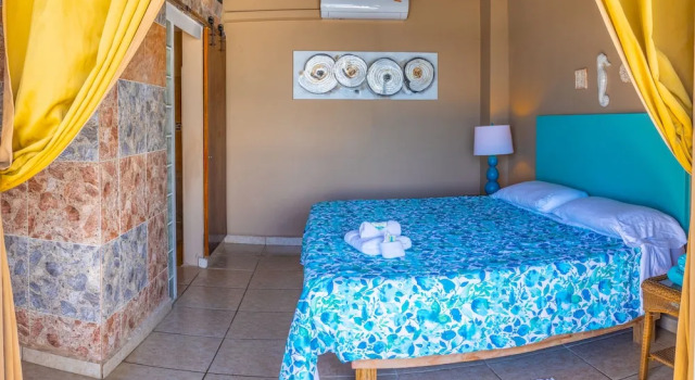 Семейная вилла с 5 комнатами oceanfront Sunset Paradise Villas