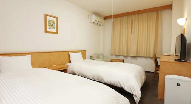 Кровать в общем номере (женский номер) Business Hotel Isesaki Heisei Inn