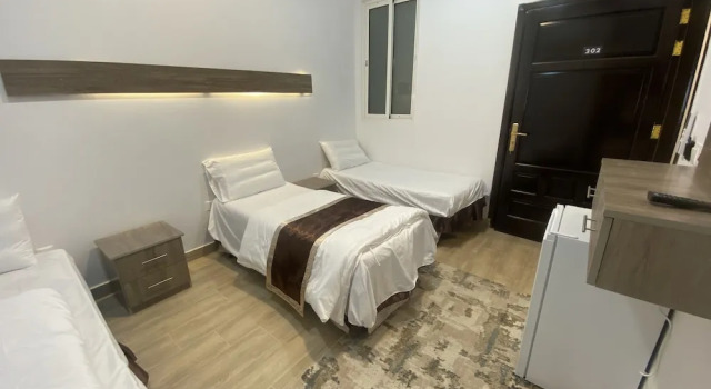 Трёхместный номер Deluxe ARAM Suites