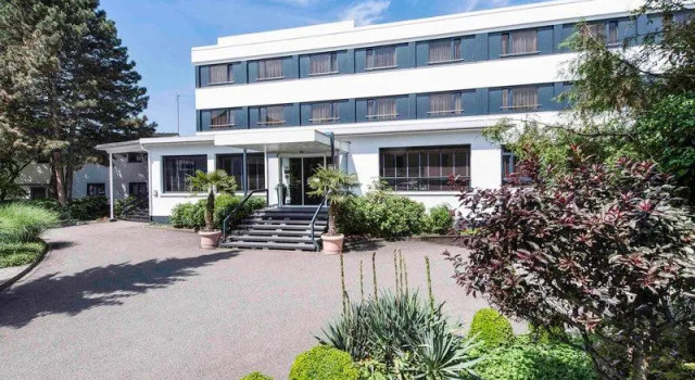 Кровать в общем номере Offenburg City Hotel by Belvilla