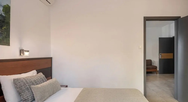 Четырёхместные апартаменты с балконом Nontas Suites