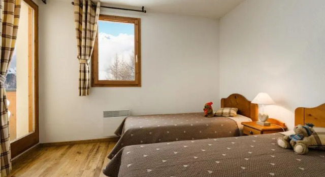 Кровать в общем номере с 2 комнатами Résidence Lagrange Vacances LArollaie