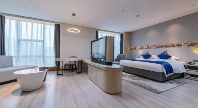 Люкс Deluxe Wanxiang Hotel (huaihua guojishangmaocheng guomaodian)