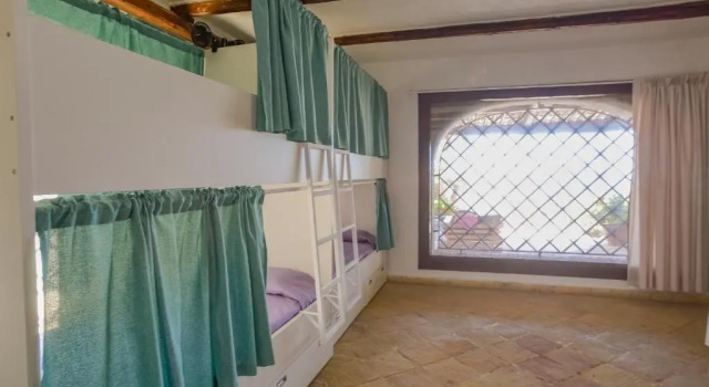 Кровать в общем номере Kite Hostel Stagnone