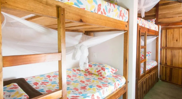 Кровать в общем номере Mundo Nuevo Eco Lodge