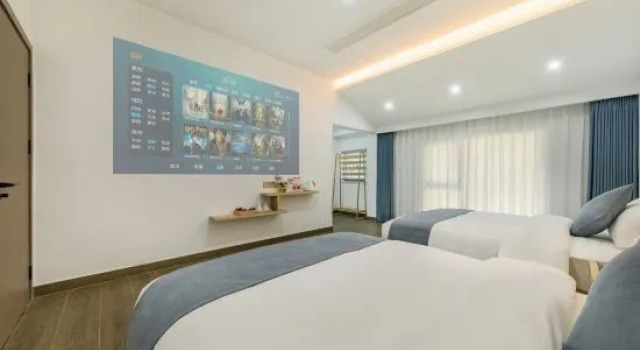 Кровать в общем номере Anji Liujian Fairyland Leisure Beauty Hotel