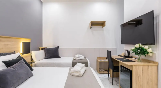 Трёхместный номер Standard SantAngelo Suites