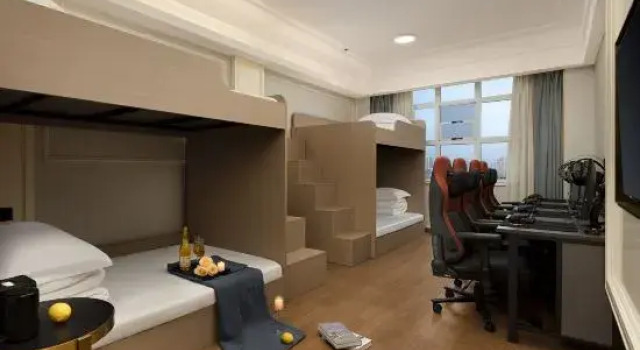 Кровать в общем номере Huanyang E-Sports Hotel (Miluo Tiyu Lane)
