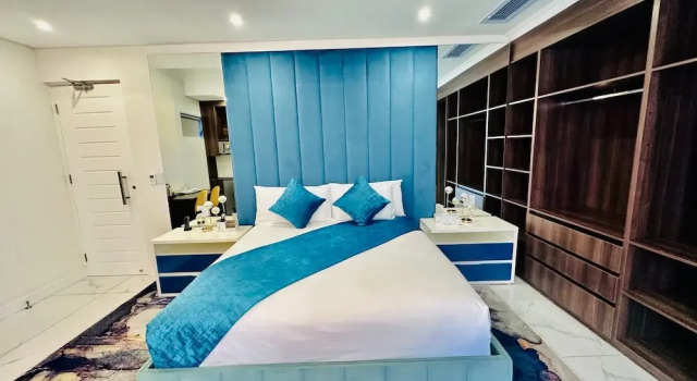 Luxo quarto H & H Boutique and Spa