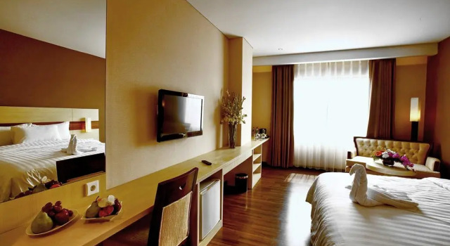 Номер Deluxe Hotel California Bandung