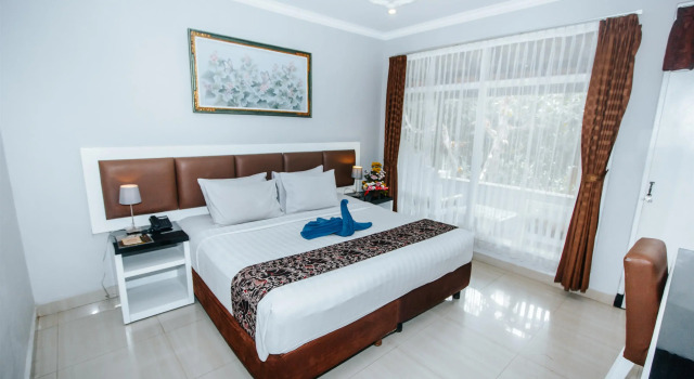 Двухместный номер Superior с балконом и с красивым видом из окна The Taman Ayu Seminyak 10 Minute walking to the BEACH
