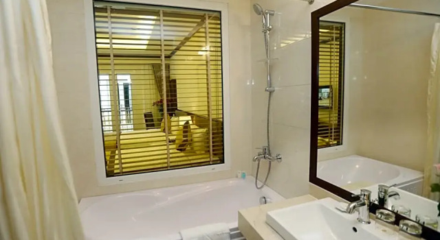 Номер Executive M Village Hotel Thợ Nhuộm, a brand of Modern Village Lifestyle