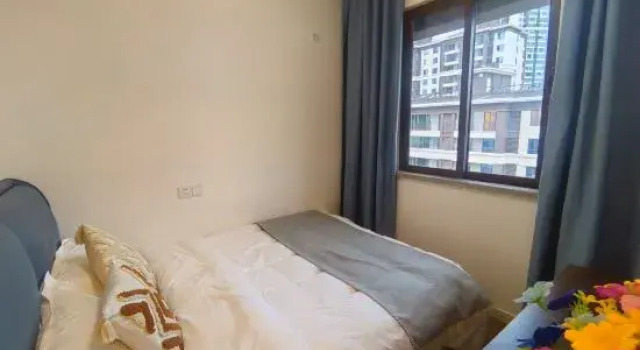 Suite 4 quartos Yimao Meiju Cinema-style Apartment (Zunyi Wuyue Plaza)