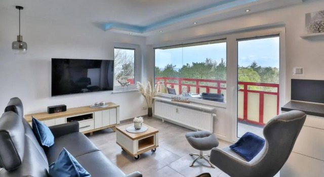 Апартаменты Terrassenhaus Duhnen Wohnung 77