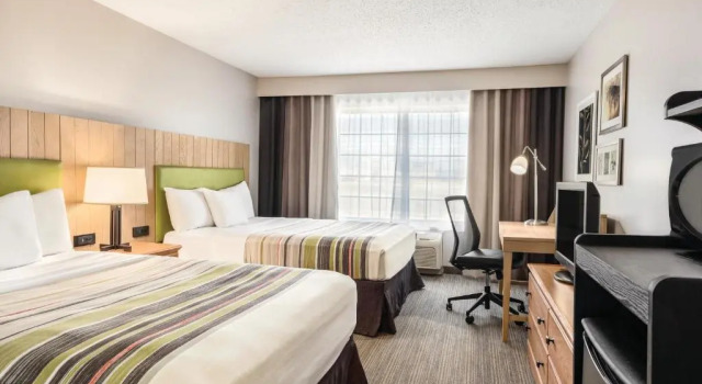 Четырёхместный номер Standard Country Inn & Suites by Radisson, Big Flats , NY