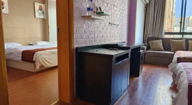 Трёхместный люкс Deluxe May Flower Fashion Hotel