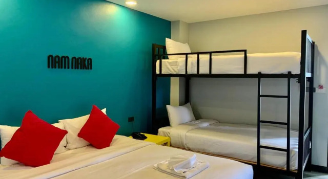 Кровать в общем номере Nam Naka Boutique Hotel - SHA Plus