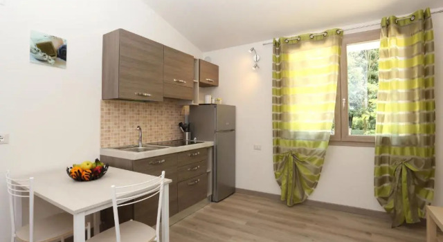 Апартаменты Villaggio Olmè