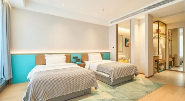 Семейный люкс Deluxe CityNote Xinuo Hotel (Taizhou West High-Speed Railway Station Branch)