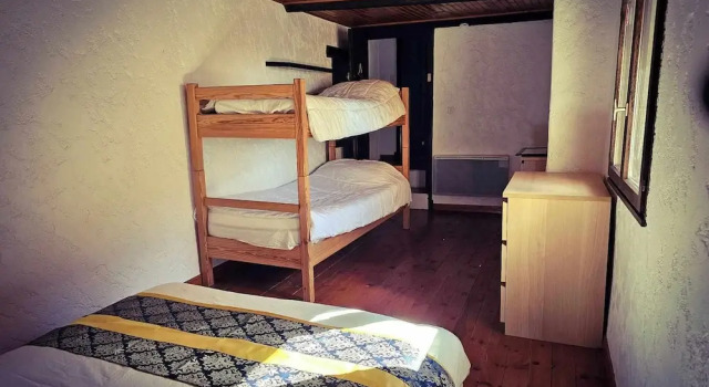 Кровать в общем номере l'Auberge La Gruppio