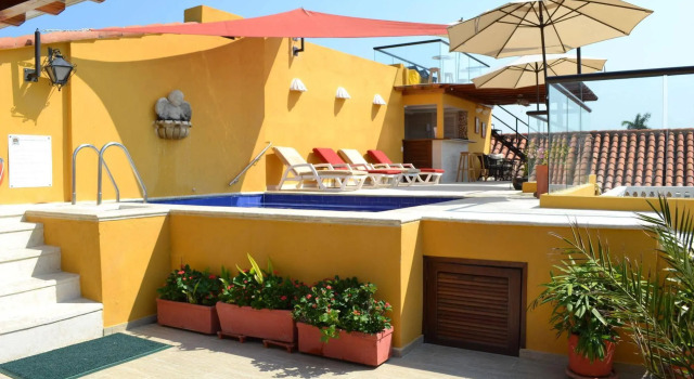 Кровать в общем номере Hotel Casa La Fe