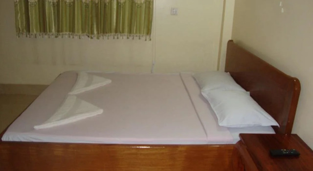 The World Guesthouse, Забронировать Отель Баттамбанг Battambang Province, рядом с Canadia Bank