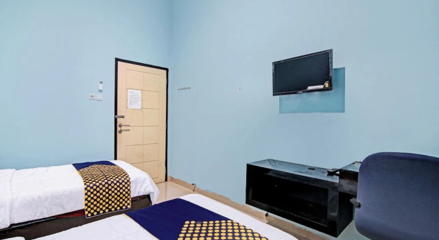 Номер Comfort Hotel O Penginapan Puti SyariahNearBandara Sultan Syarif Kasim II