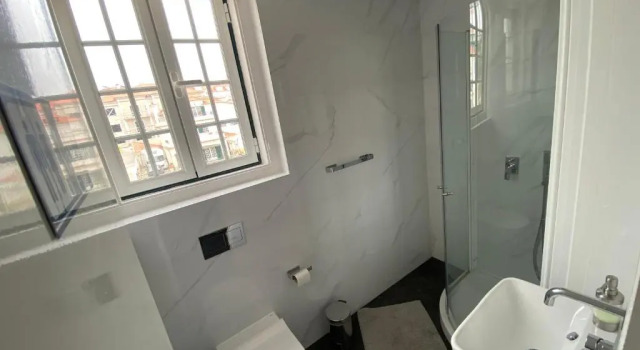 Кровать в общем номере Casa Branca