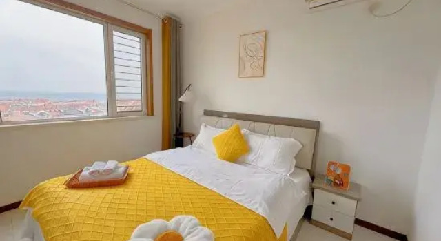 Люкс Deluxe c 1 комнатой с видом на море Langyu Boutique Holiday Apartment (Qingdao Golden Beach Branch)
