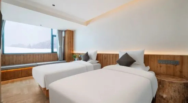 Семейный люкс с 2 комнатами с видом на внутренний двор Hemu Youyu Residence Resort Hotel (Hemu Scenic Area)