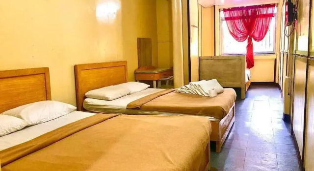 Кровать в общем номере Marian Kisad Hotel