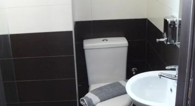 Кровать в общем номере Athens Choice Hotel