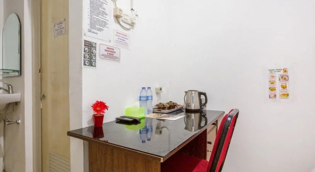Номер Deluxe RedDoorz near Jalan MP Mangkunegara Palembang
