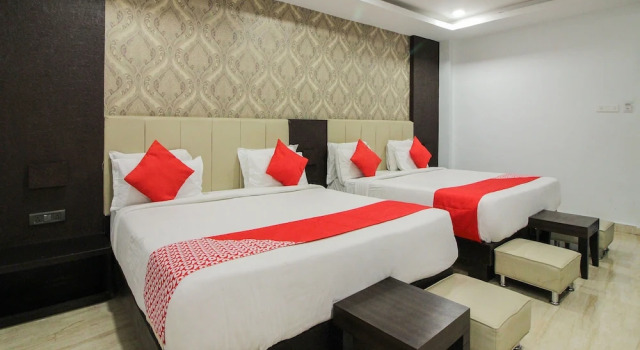 Capital O 15964 NI Ambaari Suites
