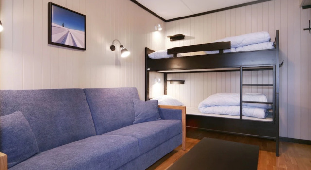Кровать в общем номере с 3 комнатами Alpin Apartments Sørlia