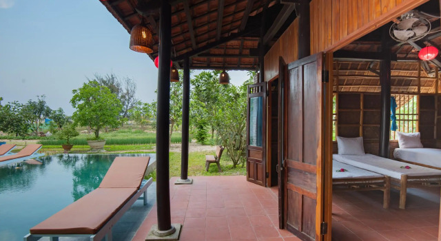 Кровать в общем номере Tra Que Flower Homestay