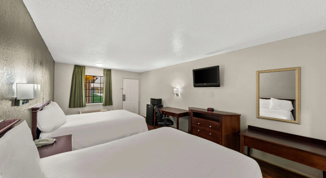 Четырёхместный номер Standard Americas Best Value Inn Bonham